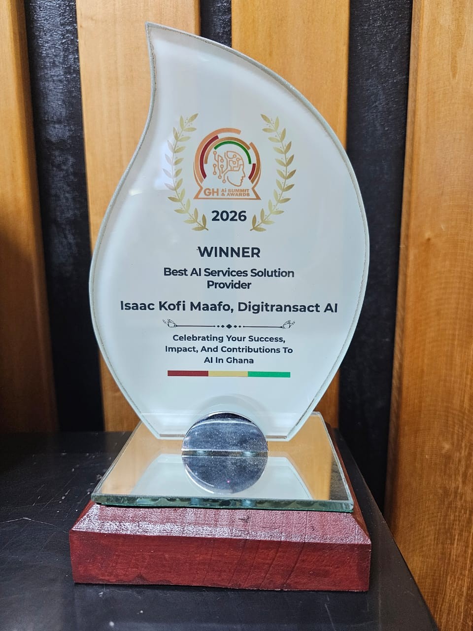 Ghana AI Summit & Awards 2026 trophy for Best AI Services Solution Provider presented to DigiTransact AI